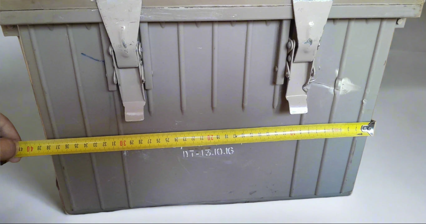 Gray storage box with a yellow measuring tape indicating dimensions
