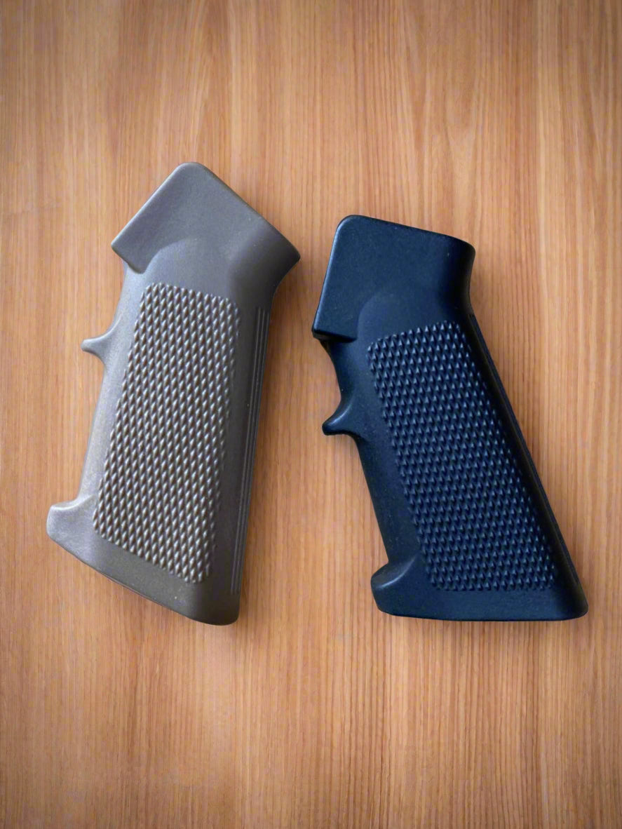 Two gun grips, one Tan and one Black