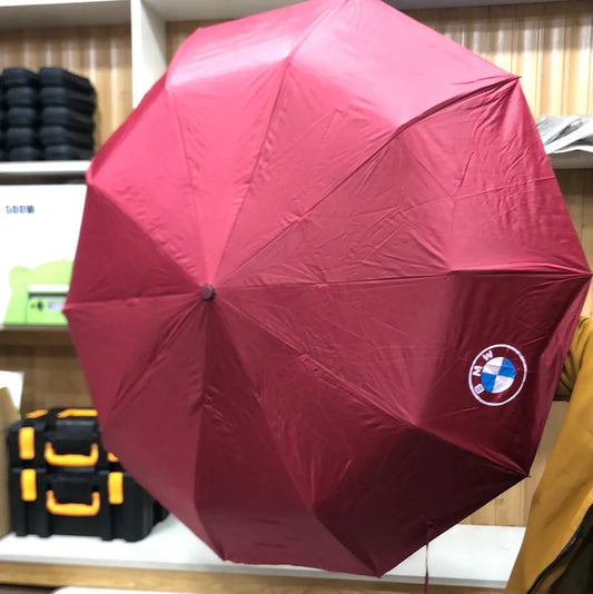 BMW folding umbrella Pakistan, luxury umbrella with LED light, auto-themed umbrella, compact umbrella for rain, windproof umbrella Pakistan, stylish rain umbrella, LED handle umbrella, folding umbrella for men, car umbrella Pakistan, premium umbrella Pakistan
