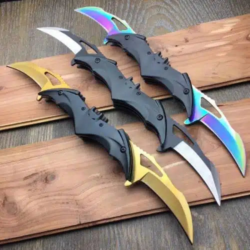 Batman Twin 2 Blade Folding Tool with dual-function blades and golden finish