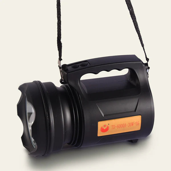 "Comfortable grip TD-6000 tactical flashlight for extended use and night operations"