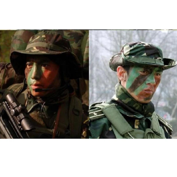 Two soldiers in camouflage gear with face paint