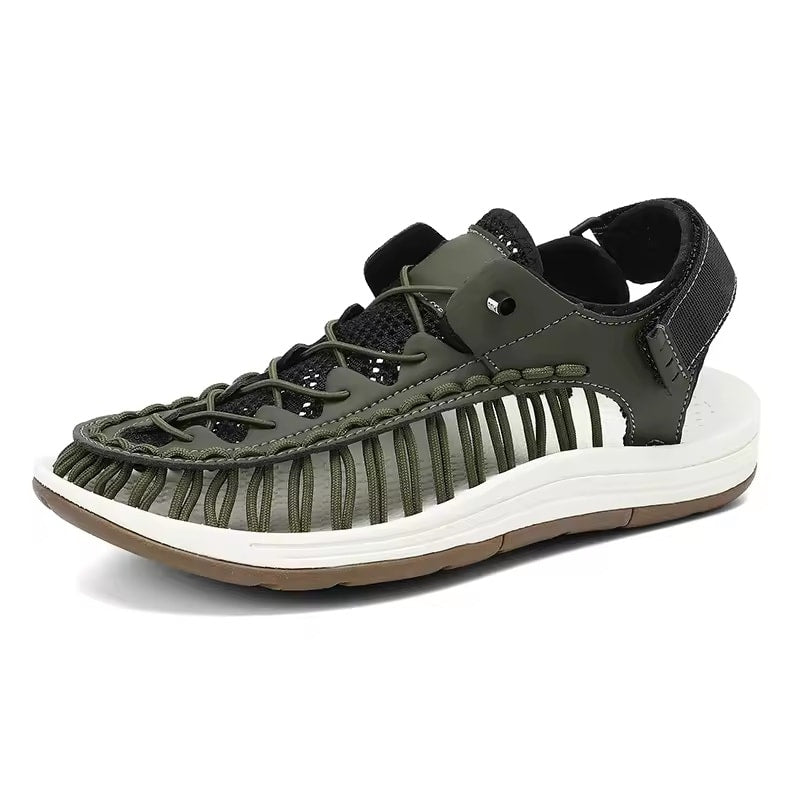 Green sandal with white sole on a white background