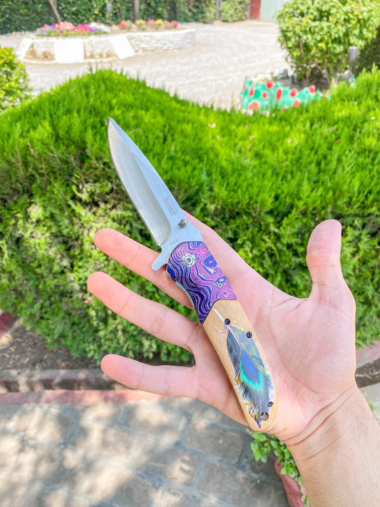 "Foxknife Folding Tool with curved design and quick-flip feature"