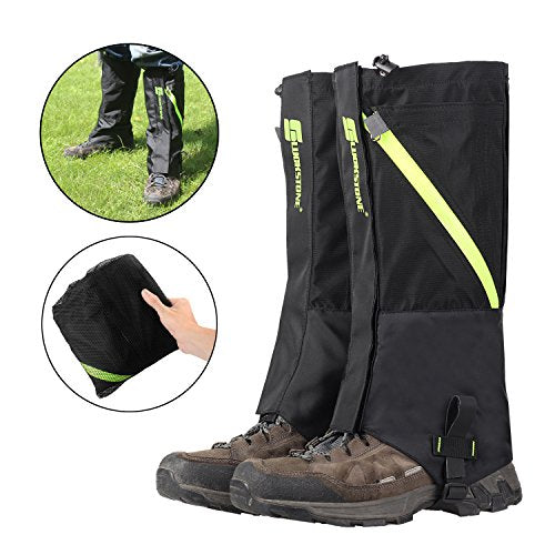 Black gaiters with green accents worn by a person