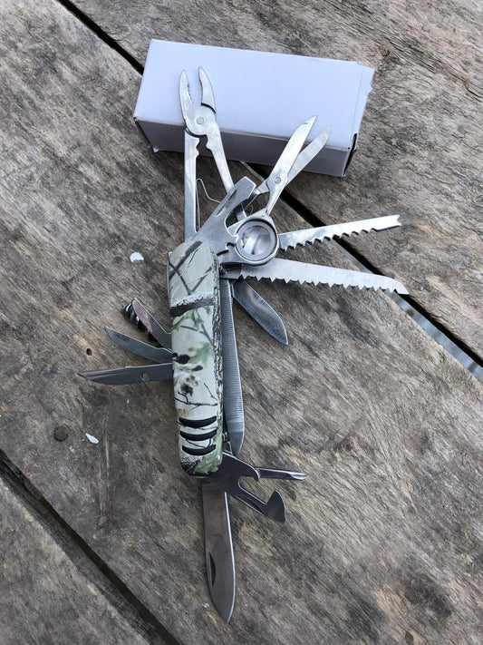 Multi-tool pocket knife, commonly known as a Swiss Army knife, featuring a camouflage pattern on its handle.